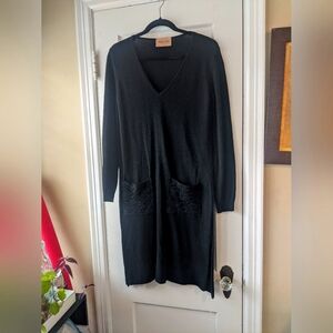 Long sleeve sweater dress with pockets. Pocket with lace embellishments.